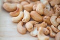 Cashew pile on wooden background