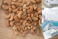 Cashew pile on wooden background