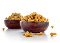 Cashew in wooden bowl on a white background. Royalty Free Stock Photo