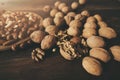 Cashews, almonds, walnuts on the wooden background Royalty Free Stock Photo