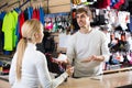 cashier helping customer at the pay desk Royalty Free Stock Photo