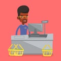 Cashier standing at the checkout in supermarket. Royalty Free Stock Photo