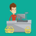 Cashier standing at the checkout in supermarket. Royalty Free Stock Photo