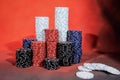 Casino abstract photo. Poker game on red background. Theme of gambling. Royalty Free Stock Photo