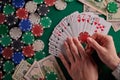 Casino background, cards and dollars and chips on the poker table. Gaming business, success Royalty Free Stock Photo