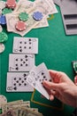 Casino background, street cards flash player and dollars and chips on the poker table. Gaming business, success. With space for Royalty Free Stock Photo