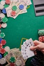 Casino background, street cards flash player and dollars and chips on the poker table. Gaming business, success. With space for Royalty Free Stock Photo