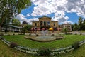 Casino building in park landscape of German spa town, fish-eye effect