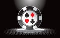 Casino chip under spotlight