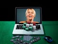 Casino chips and cards on keyboard notebook at green table. Royalty Free Stock Photo