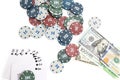 Casino chips and cards and one hundred dollars on a white background Royalty Free Stock Photo