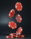 Casino chips falling on the black background Royalty Free Stock Photo