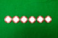 Casino chips on green background Royalty Free Stock Photo