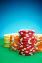Casino chips on a green mat Royalty Free Stock Photo