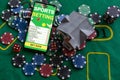 Casino chips with toy house - housing market gamble concept.