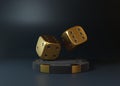 Casino chips and two golden rolling gambling dice in Flight on a black background Royalty Free Stock Photo