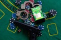 Casino chips a winning combination of cards flush royal next to the police handcuffs Royalty Free Stock Photo