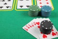 Casino chips a winning combination of cards flush royal next to the police handcuffs Royalty Free Stock Photo