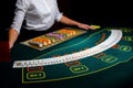 Casino: Dealer shuffles the poker cards Royalty Free Stock Photo