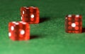 Casino dices on green cloth. The concept of online gambling.