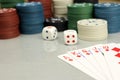 Casino elements-dice, chips, cards-a combination of Royal flush, selective focus Royalty Free Stock Photo