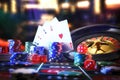 Casino game table with chips roulette cards and dice Royalty Free Stock Photo