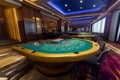 Casino interior with roulette table and chips. Royalty Free Stock Photo