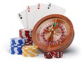 Casino o gambling concept. Roulette, casino chips, cards and dice isolated on white background Royalty Free Stock Photo