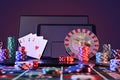 Casino online gaming concept with mobile devices and isolated background Royalty Free Stock Photo