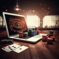 casino online. laptop with roulette chips and playing cards.