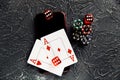 Casino play online concept. Playing chips, cards, three dices and smartphone