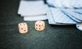 Casino poker chips stack with playing cards, dice and money on green felt background Royalty Free Stock Photo