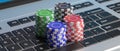 Casino poker chips stacks on a laptop keyboard. 3d illustration Royalty Free Stock Photo