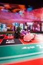 Casino purple dice and chips Royalty Free Stock Photo