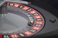 Casino roulette detail with ball in number thirteen. Gambling