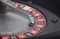 Casino roulette detail with ball in number twenty-five. Gambling Royalty Free Stock Photo