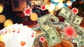Casino with roulette, poker cards, chips and money fly with sparks, creative idea. Casino and online gamble creative. Win, concept Royalty Free Stock Photo