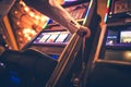 Casino Slot Machine Player Royalty Free Stock Photo