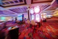 Casino theme out of focus , motion blurred rows of Casino slot machines in a casino with Shallow Depth of Field. Las Vegas Royalty Free Stock Photo