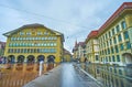 Casinoplatz square with surrounding buildings with large murals in Bern, Switzerland