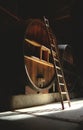 Cask & Ladder in Dark Cellar Royalty Free Stock Photo