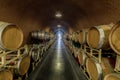 Cask storage in underground wine cellar in California Wine Country Royalty Free Stock Photo