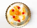 Cassata siciliana on white wooden table