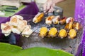 Cassava and roasted banana on the grille for sale in market Royalty Free Stock Photo