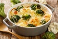 Casserole Cauliflower and broccoli baked with cheese sauce in a pot close-up. horizontal