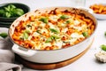 a casserole dish with baked pasta and cheese