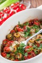 Casserole with mediterranean style baked fish with vegetables Royalty Free Stock Photo