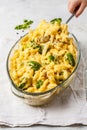 Casserole with pasta, chicken, broccoli and cheese crust in a glass form. Royalty Free Stock Photo