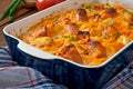 Casserole with sausage, bacon and apples