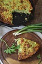 Casserole with zucchini , a piece of quiche with zucchini and he Royalty Free Stock Photo